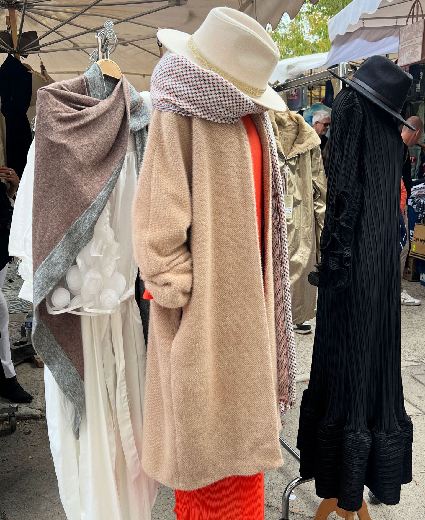 Beige coat and hat in St.Tropez market