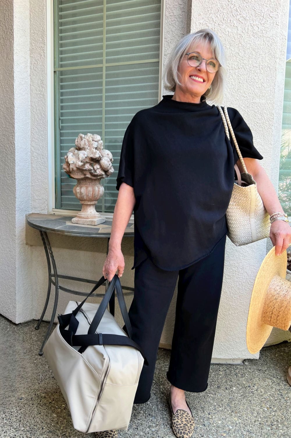 Layered outfit idea for cool mornings while traveling abroad over 50