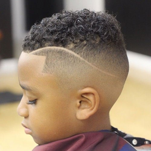 Short Curly Hair with Shaved Sides and Design