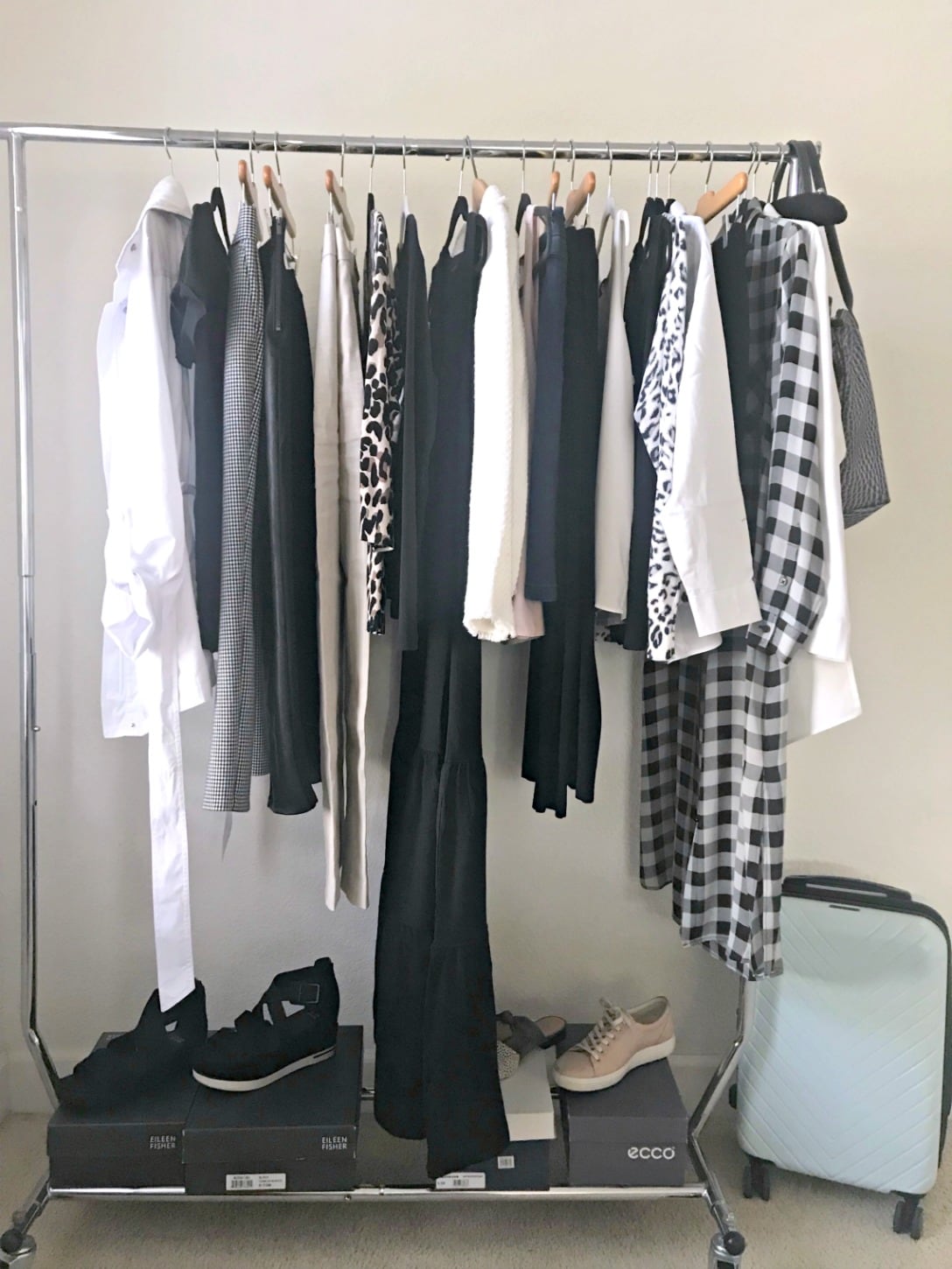rolling rack of clothes for river boat cruise on A Well Styled Life
