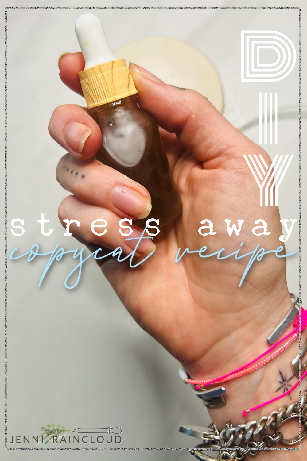 Hand holding DIY Stress Away in a glass dropper bottle