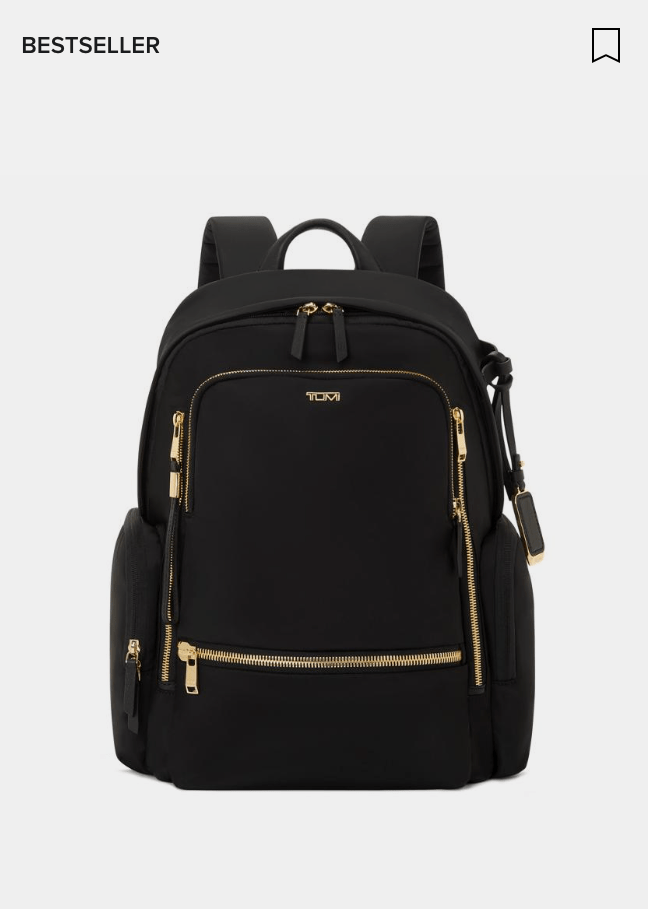 A stylish black TUMI backpack featuring gold zippers and multiple compartments, ideal for both work and casual outings.