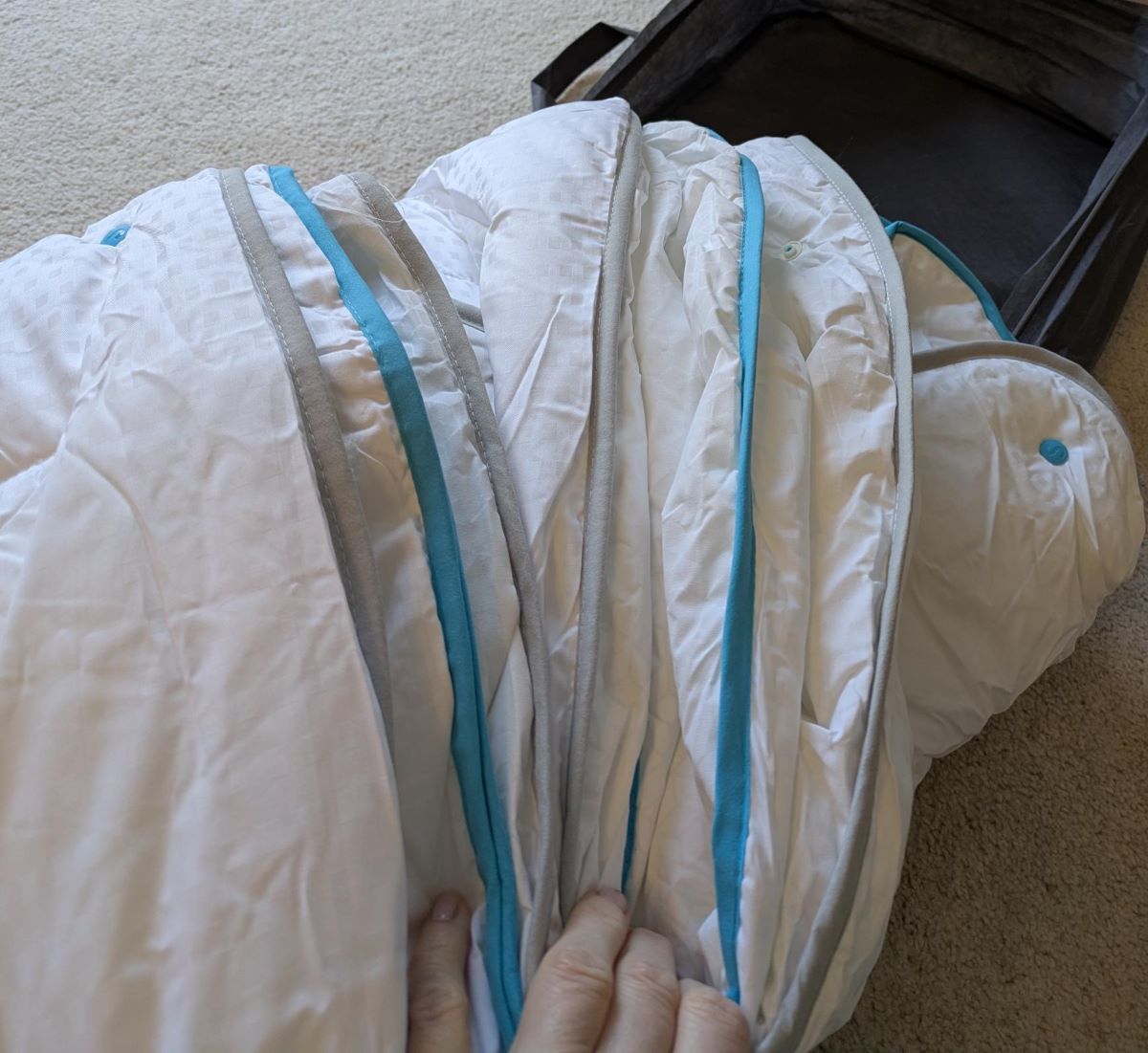 The Simba hybrid duvet showing the grey and blue piping and clip together system
