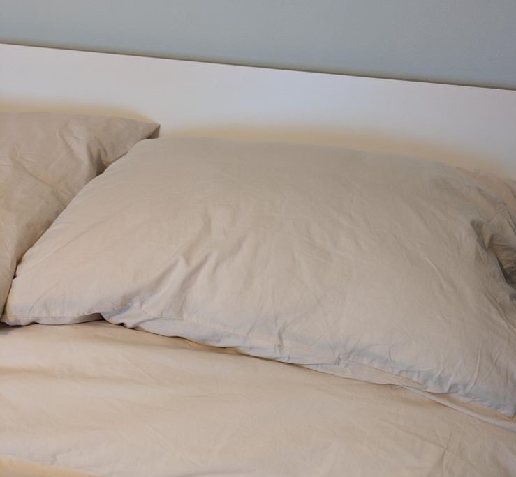 Simba Hybrid pillow on the bed for the review